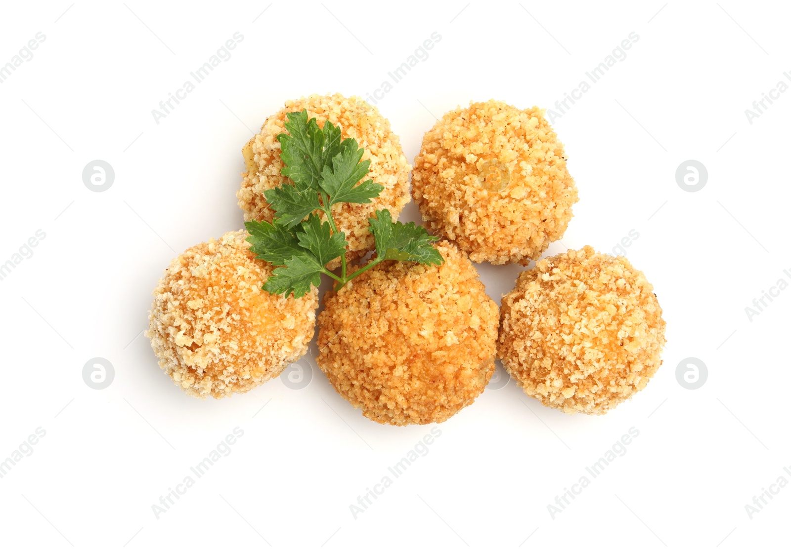 Delicious fried croquette balls and parsley isolated on white, top view Photo of Delicious fried croquette balls and parsley isolated on white, top view
