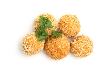 Photo of Delicious fried croquette balls and parsley isolated on white, top view