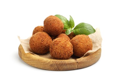 Photo of Delicious fried croquette balls and basil isolated on white