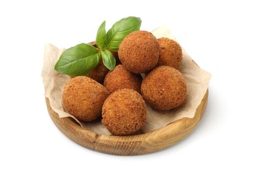 Photo of Delicious fried croquette balls and basil isolated on white
