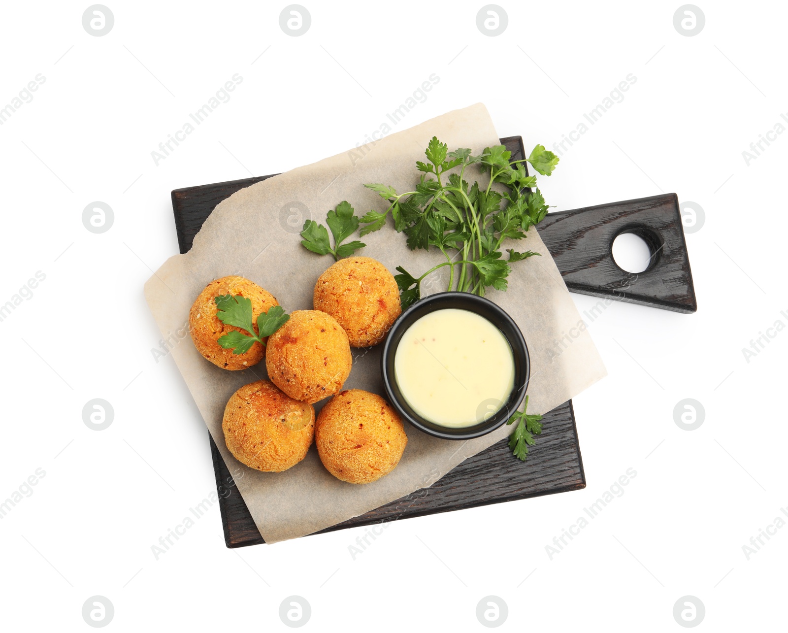 Delicious fried croquette balls with parsley and sauce isolated on white, top view Photo of Delicious fried croquette balls with parsley and sauce isolated on white, top view