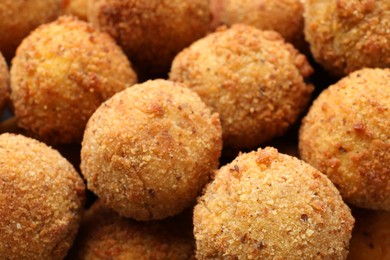 Photo of Delicious fried croquette balls as background, closeup
