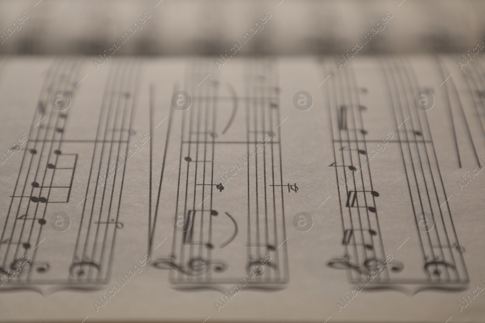 Sheets with musical notes as background, closeup Photo of Sheets with musical notes as background, closeup
