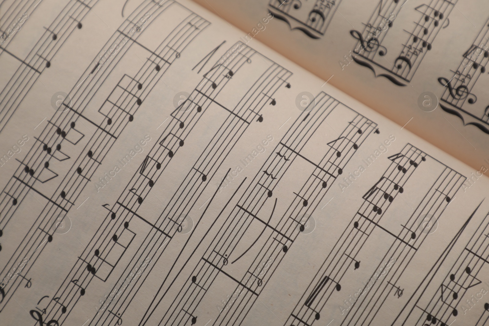 Sheets with musical notes as background, closeup Photo of Sheets with musical notes as background, closeup