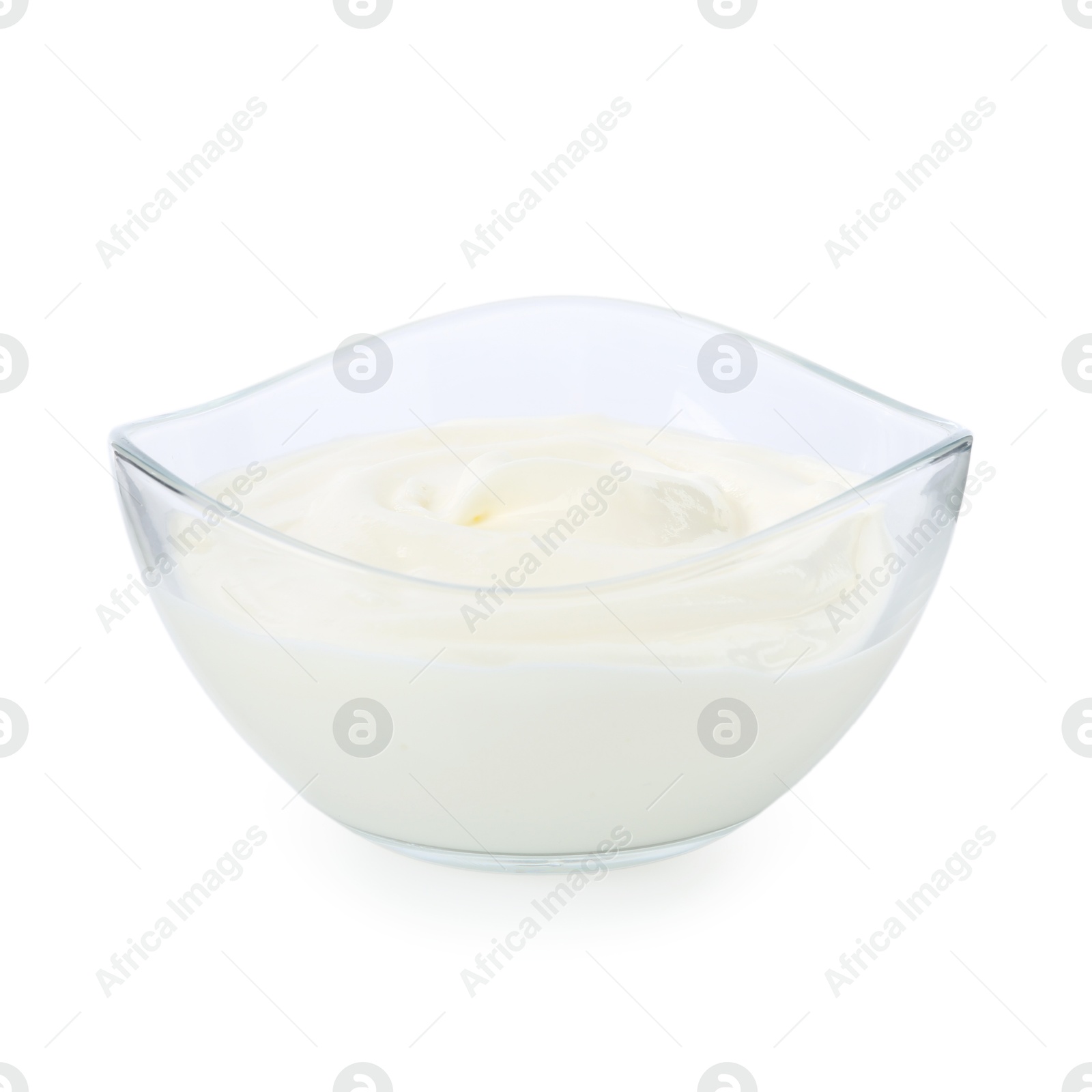 Tasty yoghurt in bowl isolated on white Photo of Tasty yoghurt in bowl isolated on white