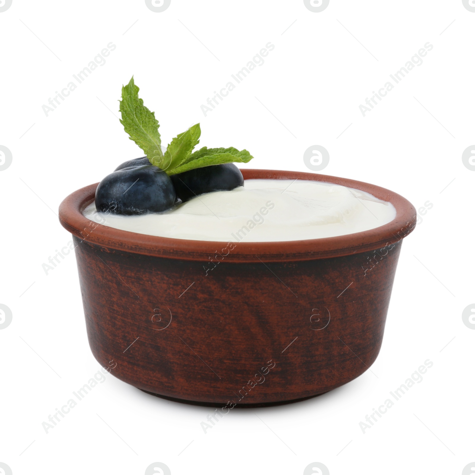 Tasty yoghurt with blueberries and mint in bowl isolated on white Photo of Tasty yoghurt with blueberries and mint in bowl isolated on white