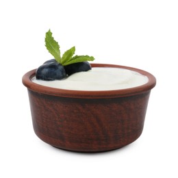 Photo of Tasty yoghurt with blueberries and mint in bowl isolated on white