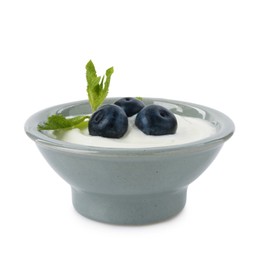 Photo of Tasty yoghurt with blueberries and mint in bowl isolated on white
