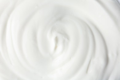Photo of Texture of tasty yogurt as background, top view