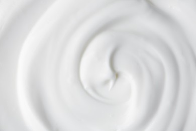 Photo of Texture of tasty yogurt as background, top view