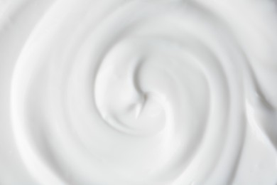Photo of Texture of tasty yogurt as background, top view