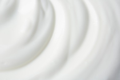 Photo of Texture of tasty yogurt as background, top view