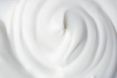 Photo of Texture of tasty yogurt as background, top view