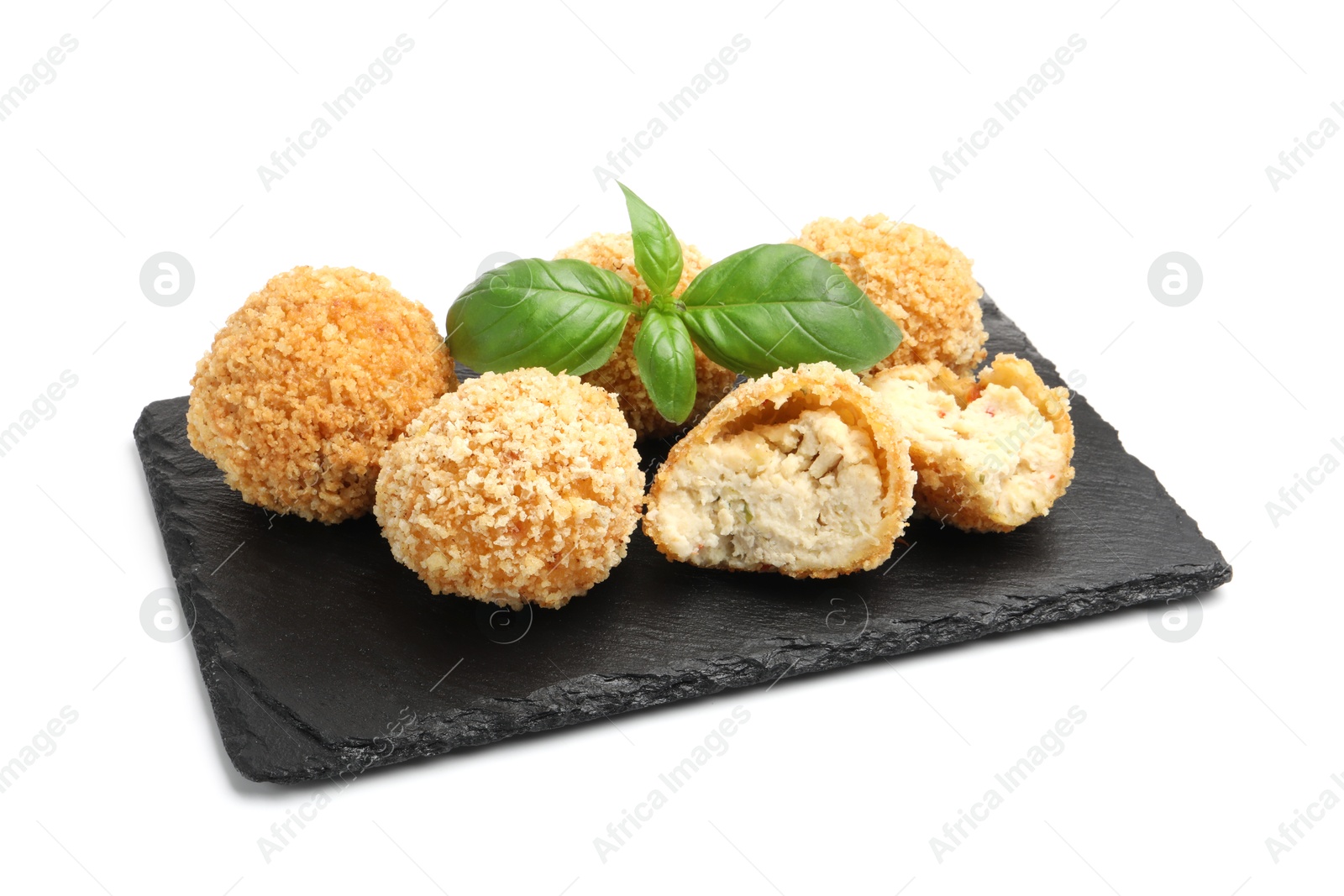 Delicious fried croquette balls with basil isolated on white Photo of Delicious fried croquette balls with basil isolated on white