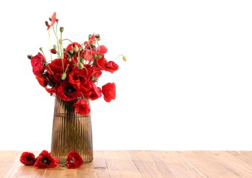 Photo of Beautiful red poppy flowers in vase on wooden table against white background
