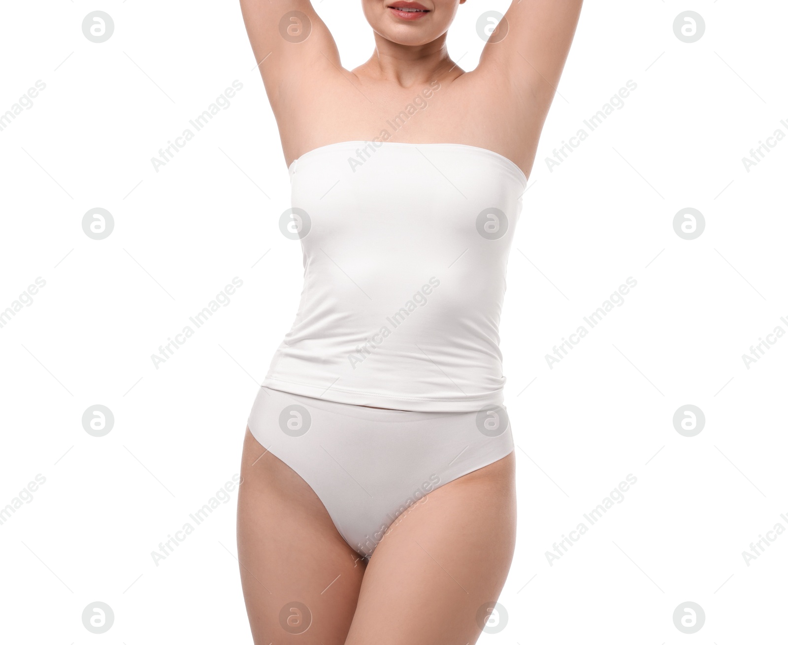 Woman in underwear on white background, closeup Photo of Woman in underwear on white background, closeup