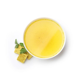Photo of Aromatic bouillon cubes, broth and parsley isolated on white, top view