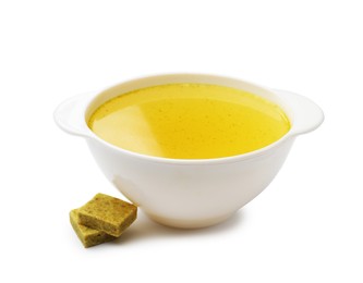 Photo of Aromatic bouillon cubes and broth isolated on white