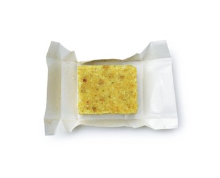 Photo of One aromatic bouillon cube isolated on white, top view