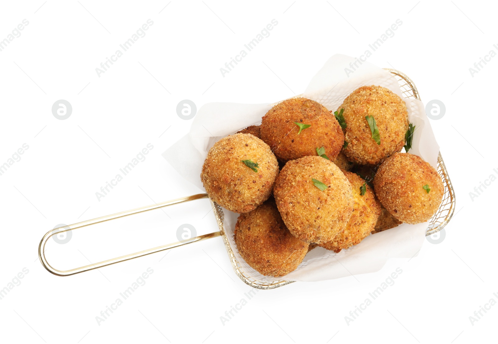 Photo of Delicious fried croquette balls with parsley in metal basket isolated on white, top view