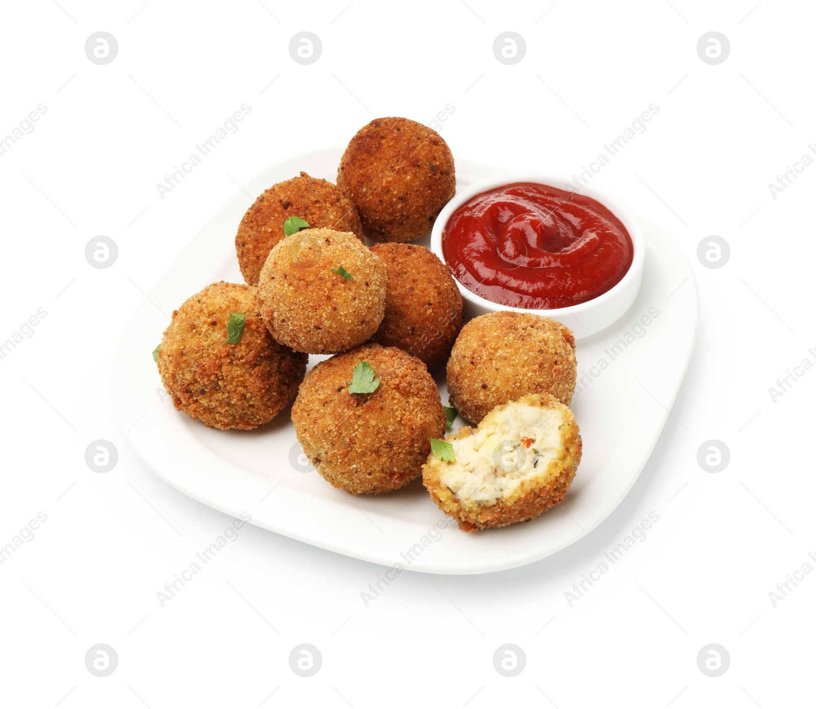 Delicious fried croquette balls with parsley and ketchup isolated on white Photo of Delicious fried croquette balls with parsley and ketchup isolated on white
