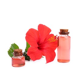 Photo of Beautiful red hibiscus flower and cosmetic products isolated on white