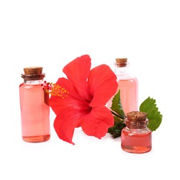 Photo of Beautiful red hibiscus flower and cosmetic products isolated on white
