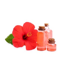 Photo of Beautiful red hibiscus flower and cosmetic products isolated on white