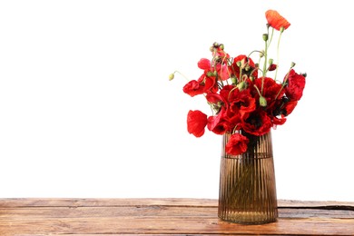 Photo of Beautiful red poppy flowers in vase on wooden table against white background