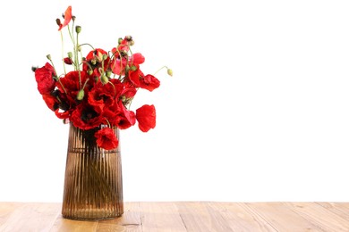 Photo of Beautiful red poppy flowers in vase on wooden table against white background