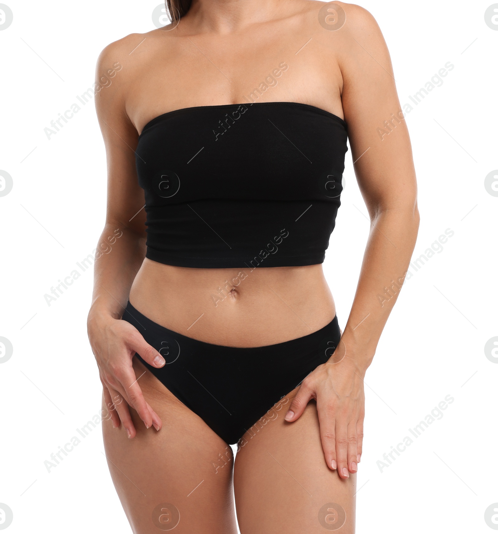 Fit woman with perfect body on white background, closeup Photo of Fit woman with perfect body on white background, closeup