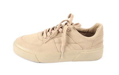 Photo of One stylish beige sneaker on white background