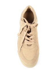 Photo of One stylish beige sneaker on white background, above view