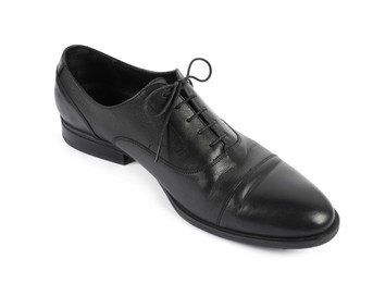 Photo of One black leather shoe on white background