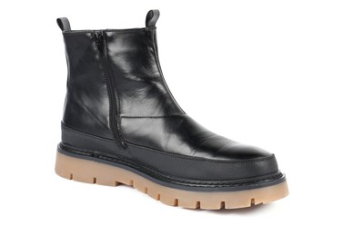 Photo of One stylish black boot on white background