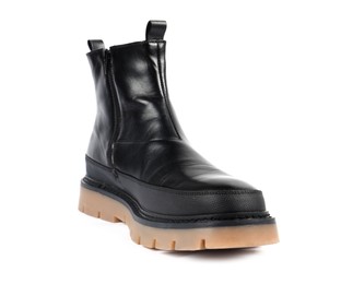 Photo of One stylish black boot on white background