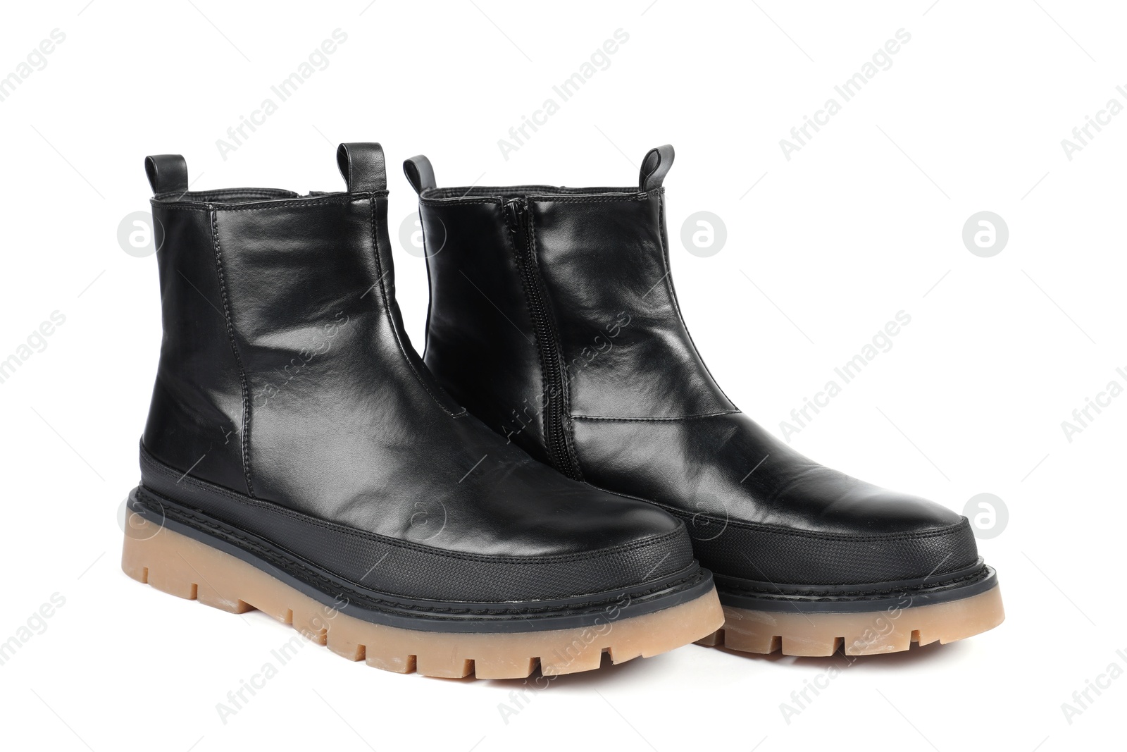 Photo of Pair of stylish black boots on white background