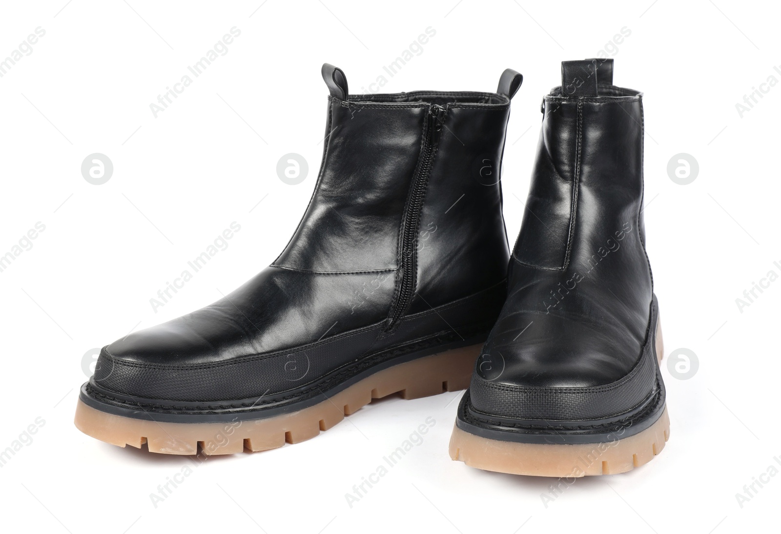 Photo of Pair of stylish black boots on white background