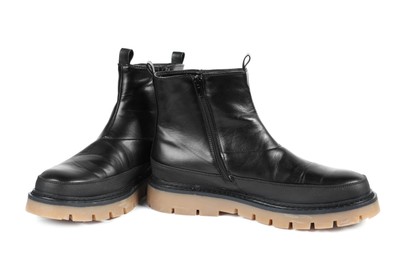 Photo of Pair of stylish black boots on white background