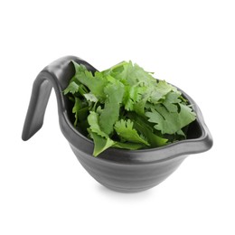 Photo of Aromatic cilantro in gravy boat isolated on white