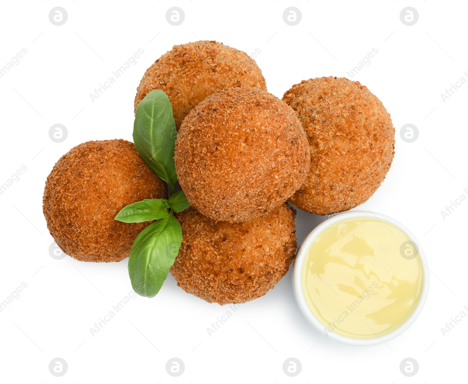 Delicious fried croquette balls, sauce and basil isolated on white, top view Photo of Delicious fried croquette balls, sauce and basil isolated on white, top view