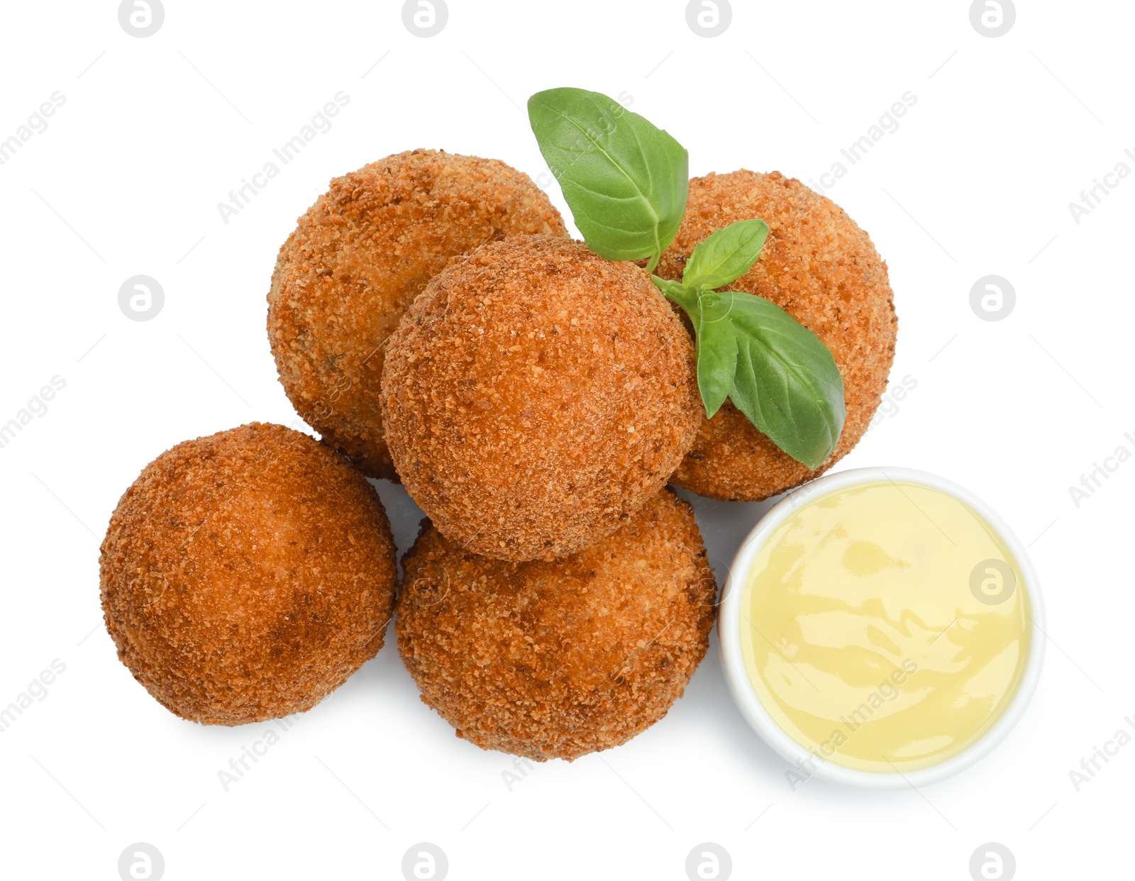 Delicious fried croquette balls, sauce and basil isolated on white, top view Photo of Delicious fried croquette balls, sauce and basil isolated on white, top view
