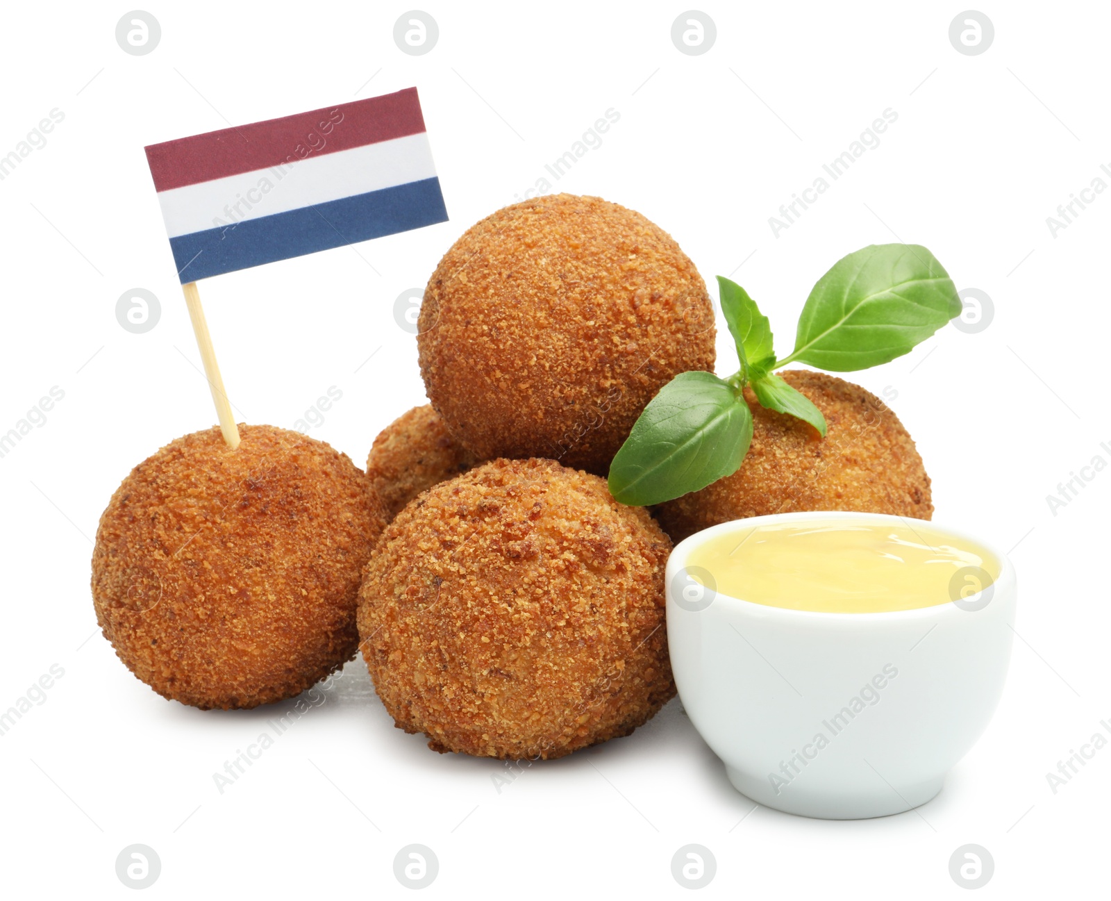 Delicious fried croquette balls, sauce, basil and small flag of Netherlands isolated on white Photo of Delicious fried croquette balls, sauce, basil and small flag of Netherlands isolated on white