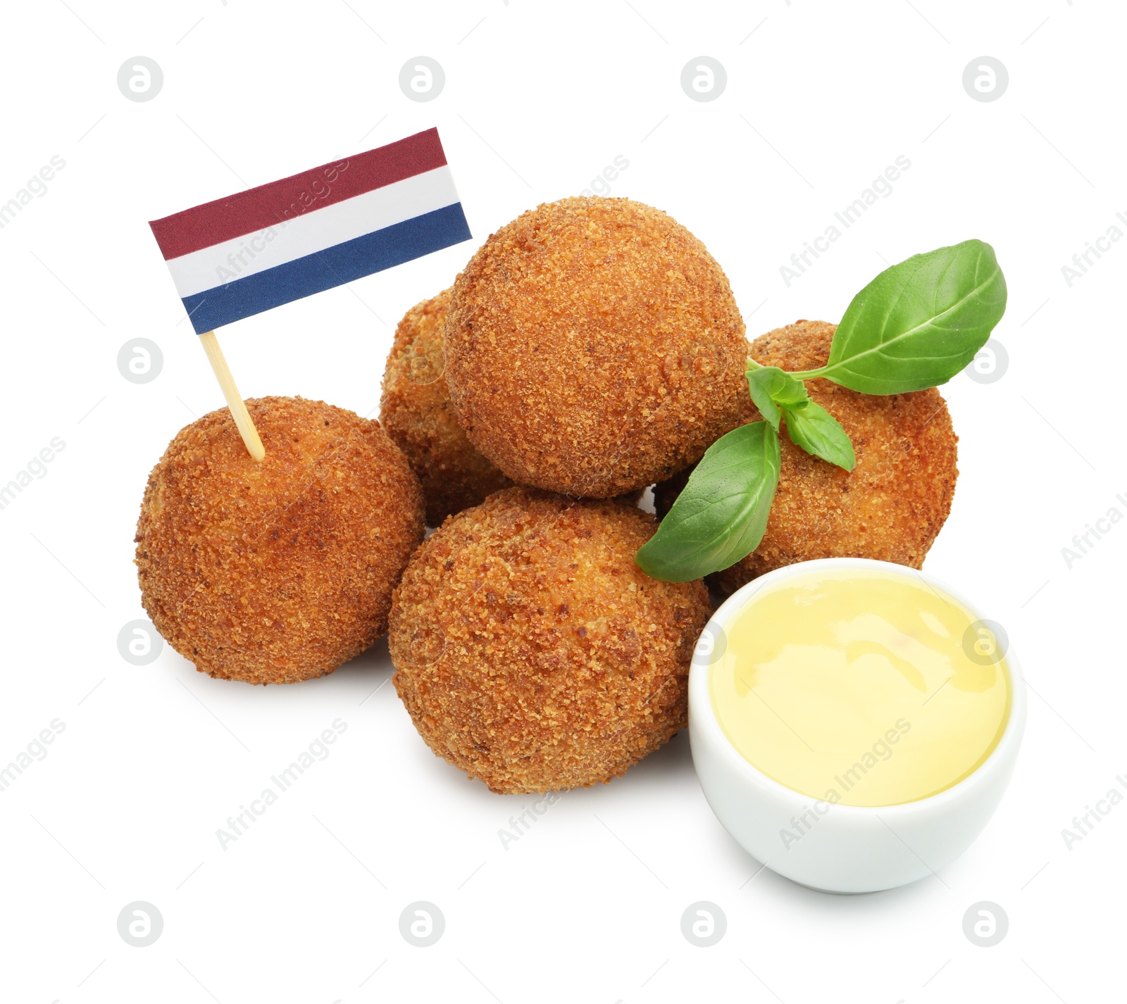 Delicious fried croquette balls, sauce, basil and small flag of Netherlands isolated on white Photo of Delicious fried croquette balls, sauce, basil and small flag of Netherlands isolated on white
