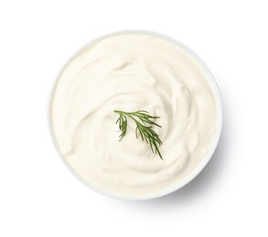 Photo of Tasty sour cream with dill in bowl isolated on white, top view
