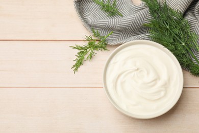 Photo of Tasty sour cream and dill on white wooden table, flat lay. Space for text