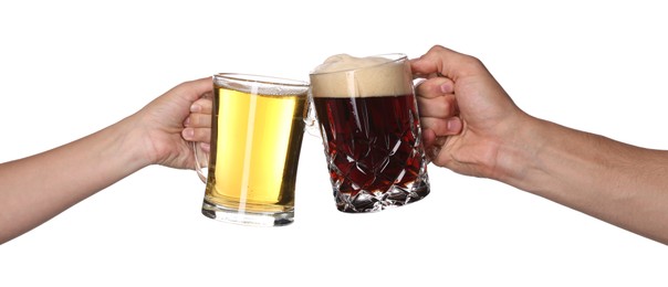 Photo of Friends clinking glasses of tasty beer on white background, closeup