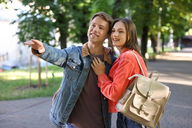 Photo of Lovely couple spending time together in park