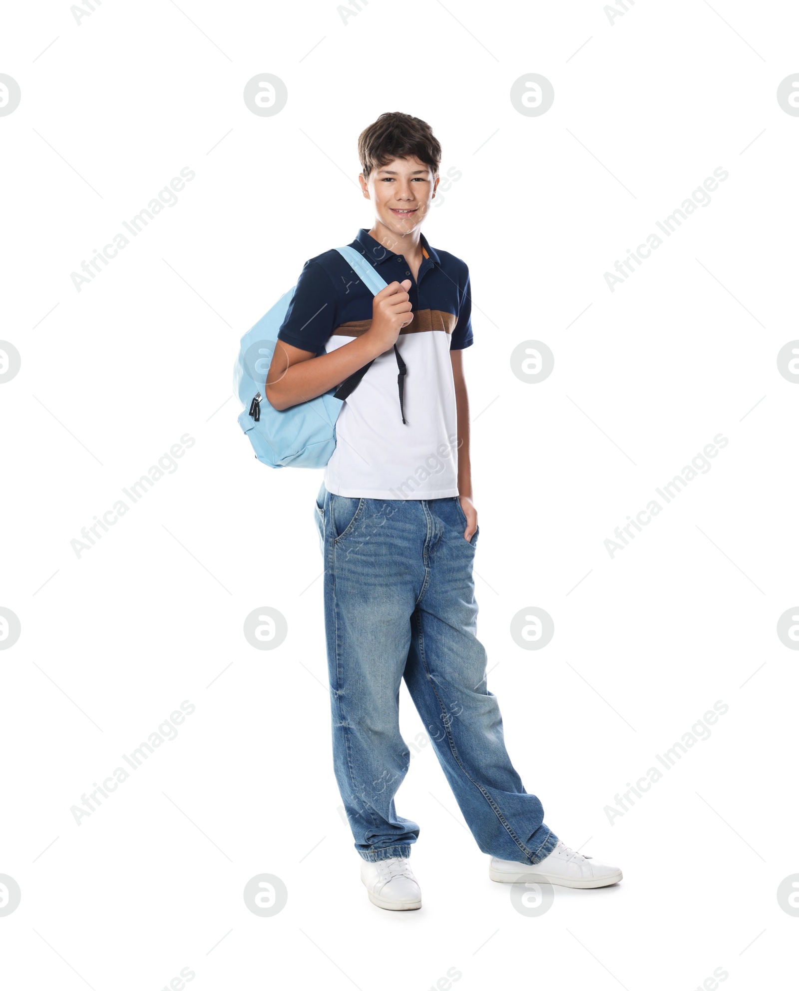 Cute teenage boy with backpack on white background Photo of Cute teenage boy with backpack on white background