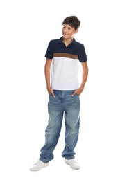 Photo of Happy teenage boy posing on white background